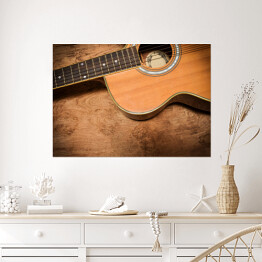 Plakat samoprzylepny Gitara akustyczna na tle imiującym nieociosane drewno