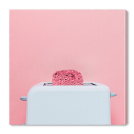 Obraz na płótnie Różowe tosty wystające z białego tostera