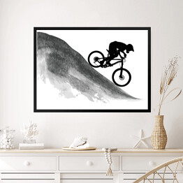 Obraz w ramie Sylwetka rowerzysty zjeżdżającego z góry