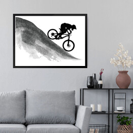 Obraz w ramie Sylwetka rowerzysty zjeżdżającego z góry