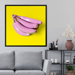 Obraz w ramie Banany w różowej farbie na niebieskim tle