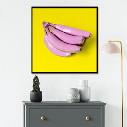 Plakat w ramie Banany w różowej farbie na niebieskim tle
