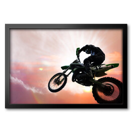 Obraz w ramie Motocykl w trakcie ekstremalnego skoku 