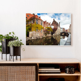 Obraz na płótnie Tradycyjne domy miasta Brugia w Belgii wzdłóż kanału