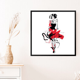 Obraz w ramie Modelka w czerwono czarnej sukni na wybiegu