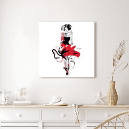 Obraz na płótnie Modelka w czerwono czarnej sukni na wybiegu