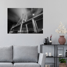Plakat Czarno białe ujęcie nowoczesnego mostu nocą
