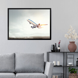 Obraz w ramie Samolot startujący o świcie