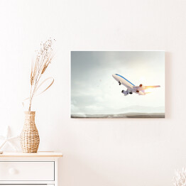 Obraz na płótnie Samolot startujący o świcie