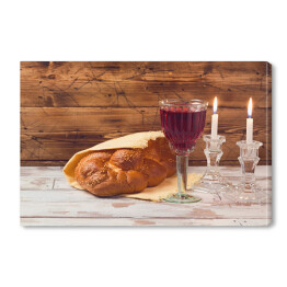 Obraz na płótnie Szabat - kielich z winem i chlebem na drewnianym stole