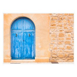 Plakat Drewniane niebieskie drzwi do domu na wyspach Morza Śródziemnego