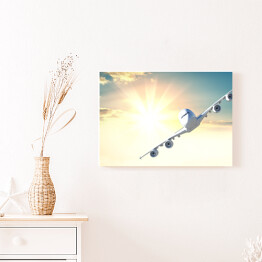 Obraz na płótnie Samolot pasażerski lecący w stronę kamery