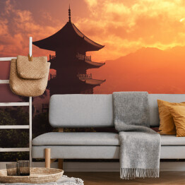 Fototapeta Chiński dom na tle zachodu slońca