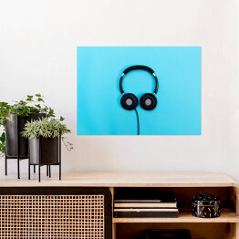 Plakat Ciemne słuchawki na niebieskim tle
