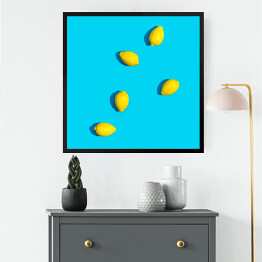 Obraz w ramie Cytryny na niebieskim tle