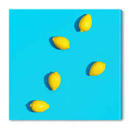Obraz na płótnie Cytryny na niebieskim tle