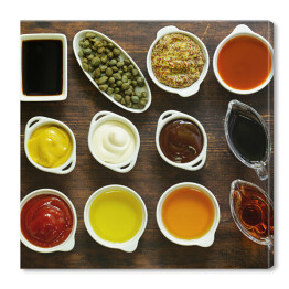 Obraz na płótnie Różne rodzaje sosów i olejów w miskach