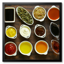 Obraz w ramie Różne rodzaje sosów i olejów w miskach