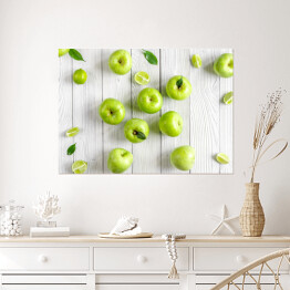 Plakat Zielone jabłka i limonki na biurku