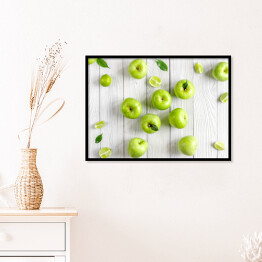Plakat w ramie Zielone jabłka i limonki na biurku
