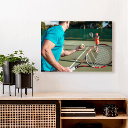 Obraz na płótnie Gracze z rakietami na odkrytym korcie tenisowym