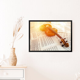 Obraz w ramie Stare skrzypce leżące na nutach