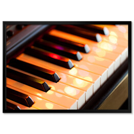 Plakat w ramie Klawisze fortepianowe z kolorowymi światłami