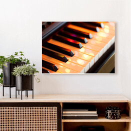 Obraz na płótnie Klawisze fortepianowe z kolorowymi światłami