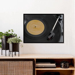 Plakat w ramie Przenośny gramofon odtwarzający płytę winylową