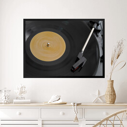 Obraz w ramie Przenośny gramofon odtwarzający płytę winylową
