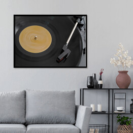 Plakat w ramie Przenośny gramofon odtwarzający płytę winylową