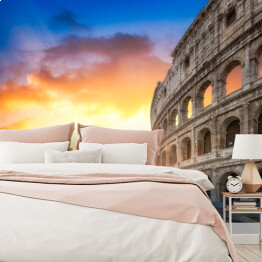 Fototapeta Koloseum w Rzymie, Włochy o wschodzie słońca