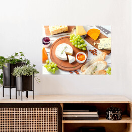 Plakat samoprzylepny Ser z winogronami i dżemem na białym drewnianym stole