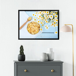 Obraz w ramie Płatki kukurydziane na błękitnym drewnianym stole