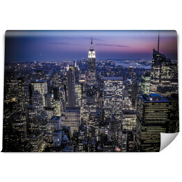 Fototapeta Rozświetlone wieżowce Manhattanu w Nowym Jorku z Empire State Building