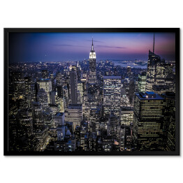 Plakat w ramie Rozświetlone wieżowce Manhattanu w Nowym Jorku z Empire State Building