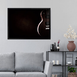 Obraz w ramie Czerwona gitara elektryczna na czarnym tle