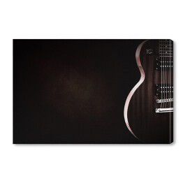 Obraz na płótnie Czerwona gitara elektryczna na czarnym tle