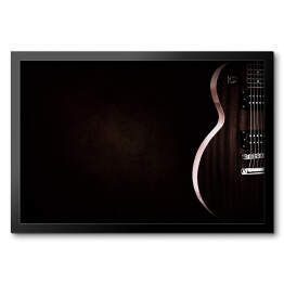 Obraz w ramie Czerwona gitara elektryczna na czarnym tle