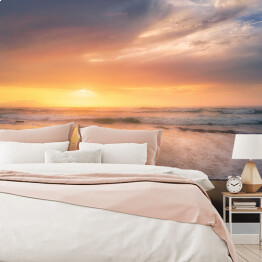 Fototapeta winylowa zmywalna Brzeg plaży o zachodzie słońca