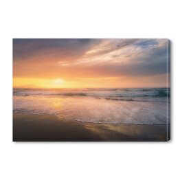 Obraz na płótnie Brzeg plaży o zachodzie słońca