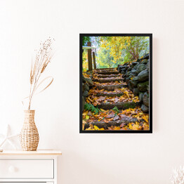 Obraz w ramie Skaliste stopnie pokryte żółtymi liśćmi w jesiennym parku 