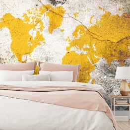 Fototapeta winylowa zmywalna Żółta mapa świata na betonie