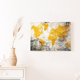 Obraz na płótnie Żółta mapa świata na betonie