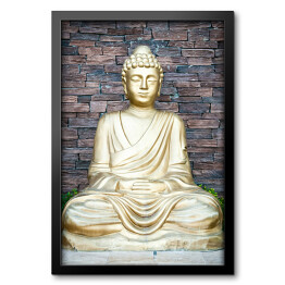 Obraz w ramie Złoty Budda na tle ściany z cegieł