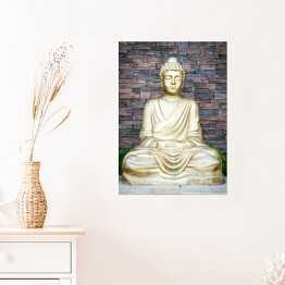 Plakat Złoty Budda na tle ściany z cegieł