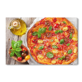 Obraz na płótnie Pizza z pomidorami, mozzarellą i bazylią