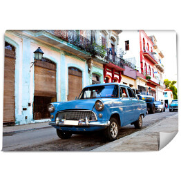 Fototapeta Niebieski klasyczny samochód na ulicach Hawany, Kuba