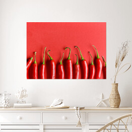 Plakat Czerwona papryka chili na czerwonym tle