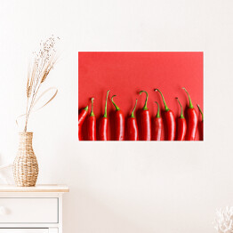 Plakat samoprzylepny Czerwona papryka chili na czerwonym tle